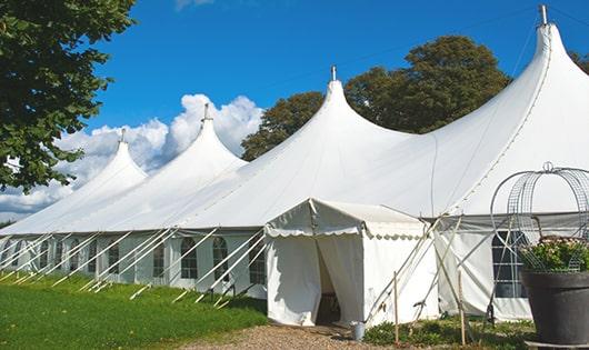 high-quality portable restrooms stationed at a wedding, meeting the needs of guests throughout the outdoor reception in Guilford, CT